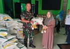 Babinsa Dampingi Pendistribusian Bantuan Pangan Beras dan Minyak Goreng kepada Warga Desa Piji